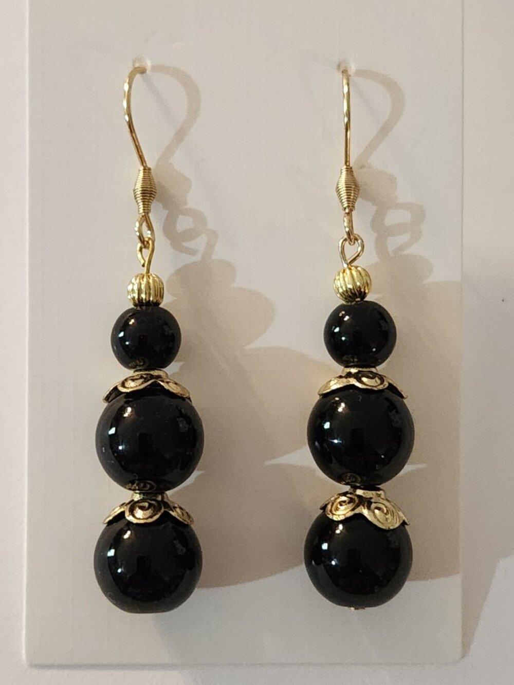 Hand Crafted Black Dangle Pierced Earrings with Gold Accents